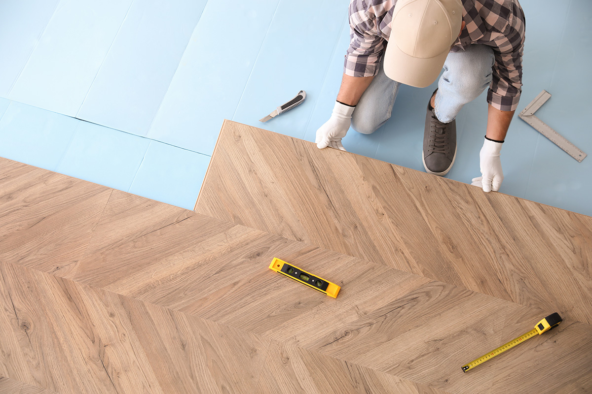 Laminate flooring professional installation in progress